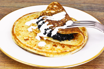 Pancakes with Black Caviar