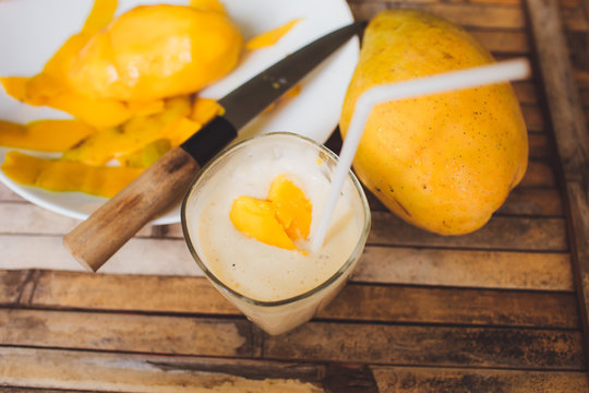 freshness fruit mango,  fresh shake with shape heart love  mango