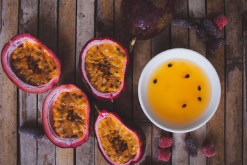 passion fruit pulp and seed board, candied fruit, plate with jam