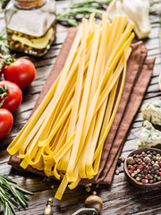 Tomatoes, spaghetti pasta and spices.