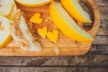 yellow melon Cantaloupe  slices with shape heart