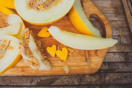 yellow melon Cantaloupe  slices with shape heart