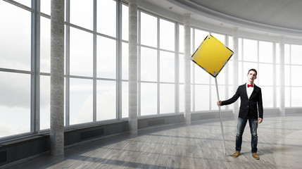 Man showing stop sign