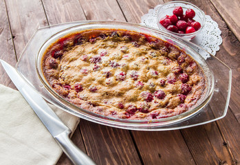 Cherry pie in a glass a plate and saucer cherries
