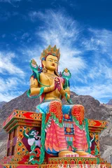 Meubelstickers Statue of Maitreya Buddha near Diskit Monastery in Ladakh, India © Zzvet