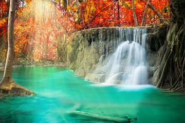 Fototapeta na wymiar Waterfall in autumn forest at Erawan waterfall National Park, Thailand 