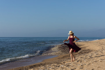 Woman walking on the beach