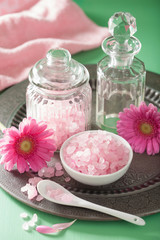 Obraz na płótnie Canvas spa aromatherapy with pink salt gerbera flowers
