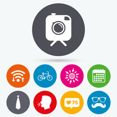 Hipster photo camera icon. Glasses symbol.