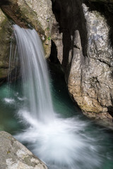 Fototapeta na wymiar Waterfall at the Val Vertova torrent Lombardy near Bergamo in It