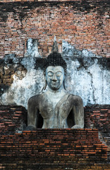 Old buddha statue in Sukhothai Historical Park.