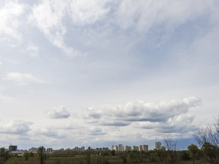 Fototapeta na wymiar Clouds over city.