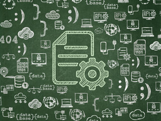 Database concept: Gear on School board background