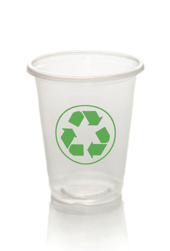 white plastic cup and recycle symbol on the white background