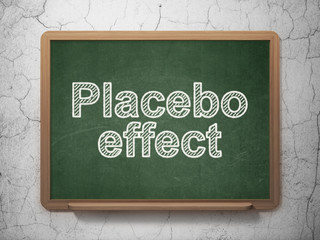 Medicine concept: Placebo Effect on chalkboard background