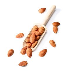 dried almonds in wooden shovel