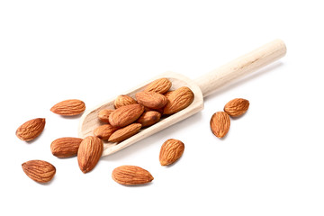 dried almonds in wooden shovel