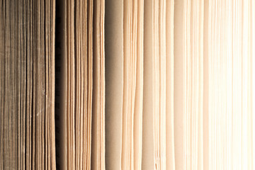 Obraz premium old book. seamless texture of book pages. Vintage old books. Books and reading are essential for self improvement, gaining knowledge and success in our careers, business and personal lives.