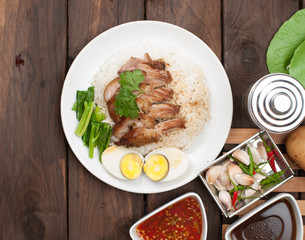 Thai stewed pork leg with rice on wood(Kao Kha Moo)