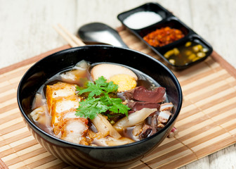 egg pork paste of rice flour, boiled Chinese pasta square on tab