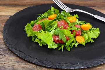 Juicy Fresh Green Salad of Lettuce, Arugula, Gapefruit and Kumqu
