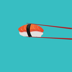 salmon sushi with red chopsticks
