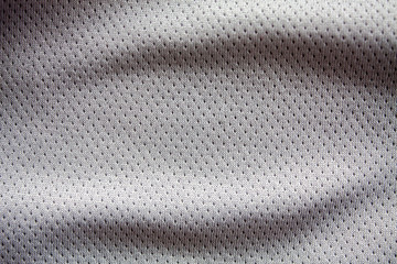 Fototapeta na wymiar gray color sports clothing fabric jersey