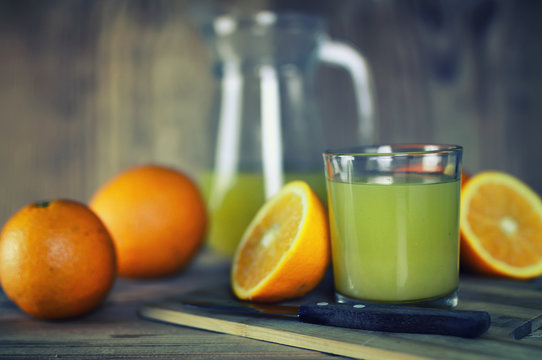 toned orange juice glass slice