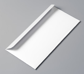 white mailing envelope with a gray background