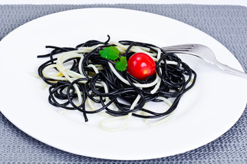 Black Spaghetti with Cuttlefish Ink, Tomato and Basil. Mediterra