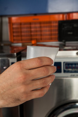 Man holding soap powder