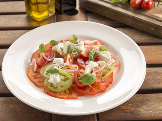 Heirloom tomatoes, torn burrata, shallots, olive oil & balsamic vinegar 

