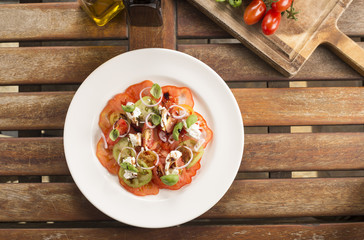 Heirloom tomatoes, torn burrata, shallots, olive oil & balsamic vinegar 
