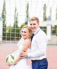 Naklejka premium European Football Championship concept. Wedding couple on the football stadium.