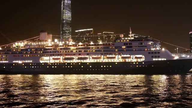 Cruise ship at the pier of Hong Kong in the evening.