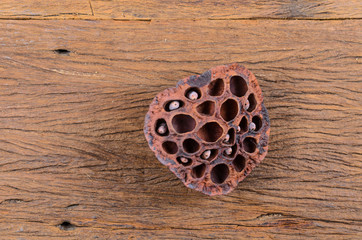 Dried of lotus seed on wooden table