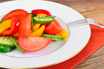 Healthy and diet food: Lettuce, tomato, pepper, seeds, oil, salt