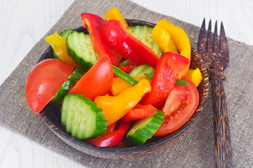Healthy and diet food: Lettuce, tomato, pepper, seeds, oil, salt