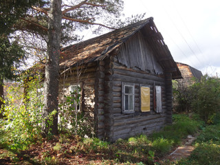 Fototapeta na wymiar House in a village in a autumn day