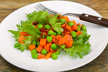 Juicy Vegetable Stew. Lettuce,  Peas and Carrots. Diet Food