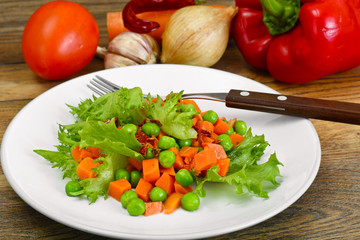 Juicy Vegetable Stew. Lettuce,  Peas and Carrots. Diet Food