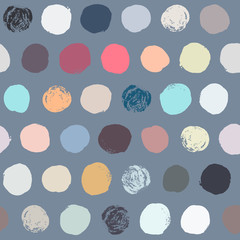 Seamless colorful polka dot pattern. © anastasiiam