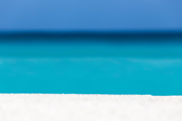 Tropical sandy beach with white sand and turquoise caribbean sea