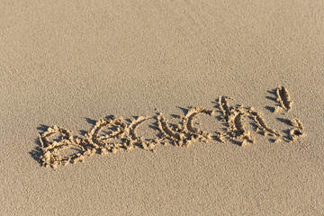 Inscription Beach! on sand