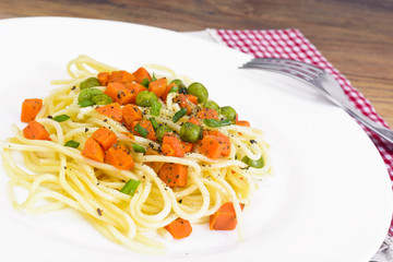 Vegetarian Pasta Spaghetti with Diced Carrots and Green Peas