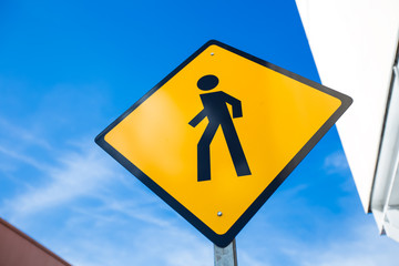 Pedestrian crossing street sign at the street