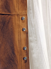 medieval dress with white shirt and leather vest