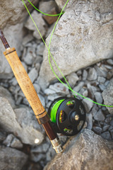 Fly fishing rod and green fly line