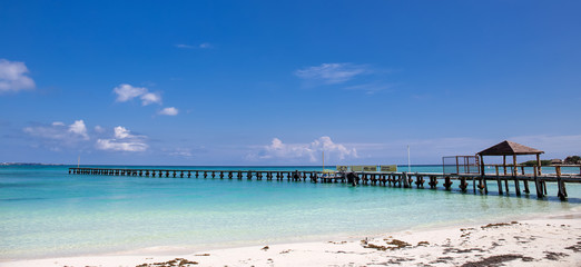 Wooden pier on tropical beach