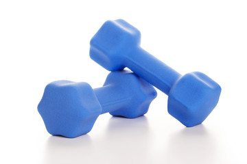 Fitness concept with two blue dumbbells on white background